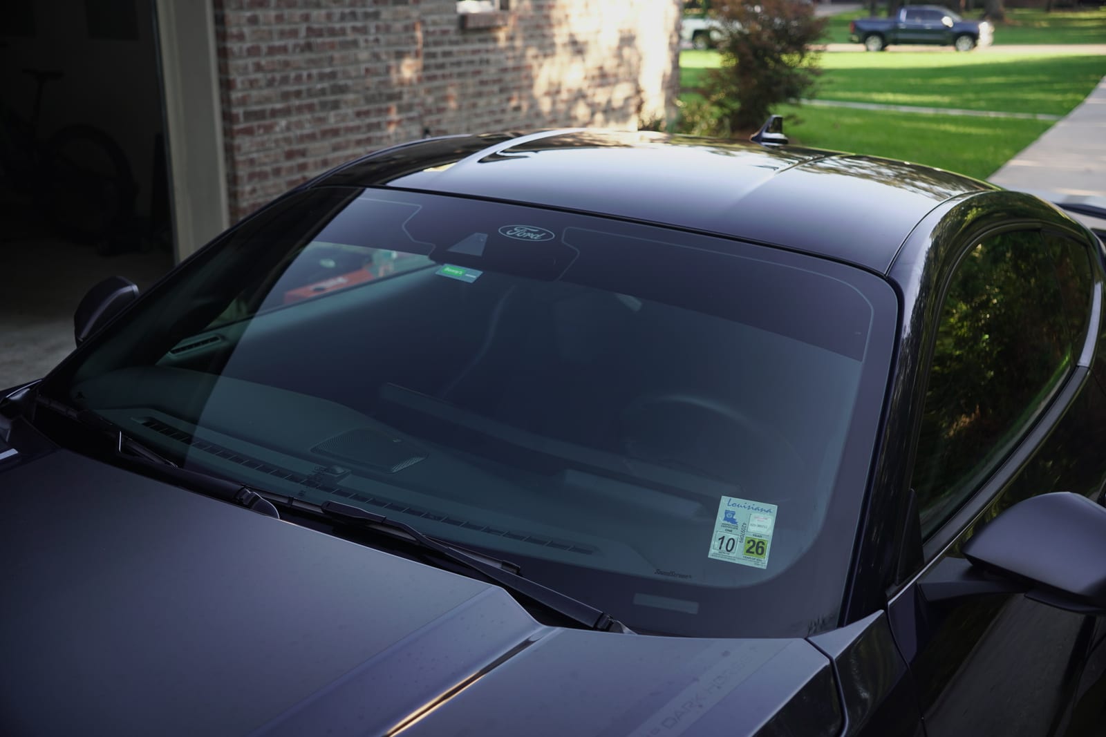 Same Ford Mustang Dark Horse after windshield tint